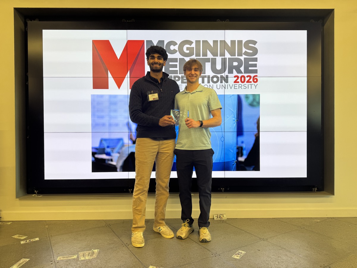 RapidEye founders Rohan Nagabhirava and Sam Parks accepting the $50,000 McGinnis Venture Competition award at Carnegie Mellon University, 2026